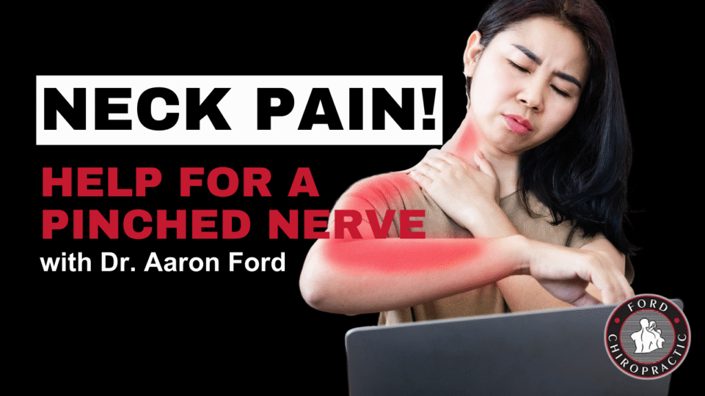woman in pain holding her neck