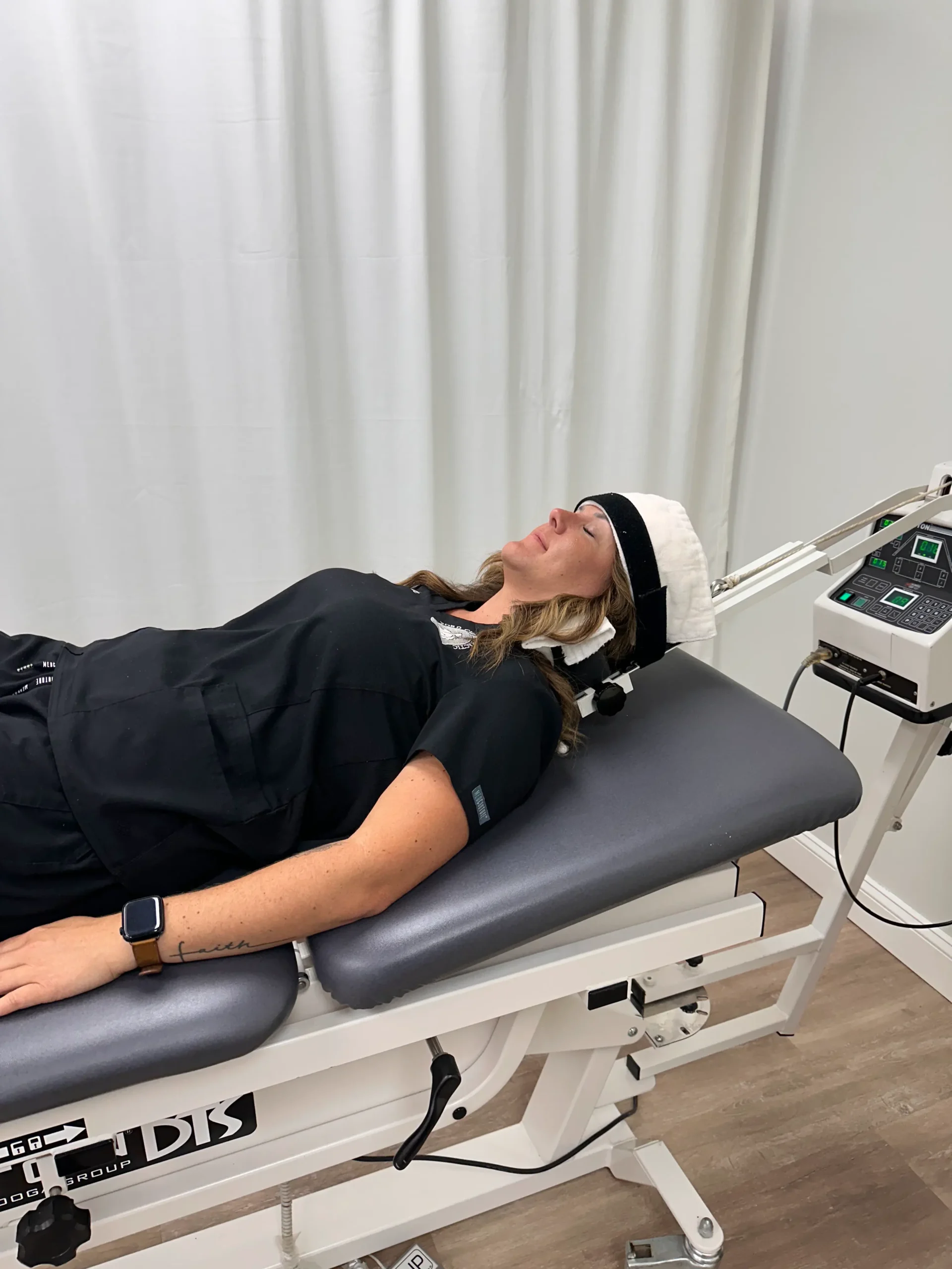 Cervical traction being performed