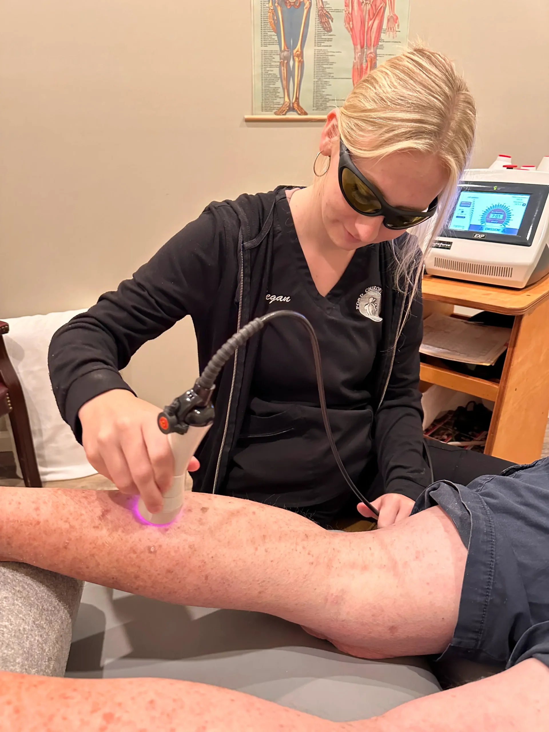 Megan performing laser therapy for neuropathy
